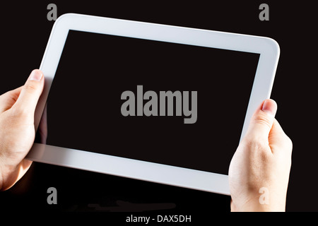 Human hand holding blank touch screen device Stock Photo