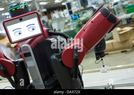 Baxter the robot made by Rethink Robotics at the Rodon Group plastic molding factory.  Stock Photo