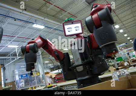 Baxter the robot made by Rethink Robotics at the Rodon Group plastic molding factory.  Stock Photo