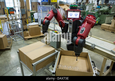 Baxter the robot made by Rethink Robotics at the Rodon Group plastic molding factory.  Stock Photo