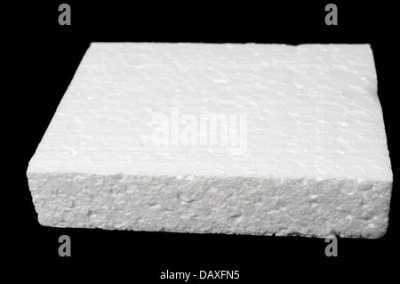 A piece of polystyrene foam isolated on black background Stock Photo