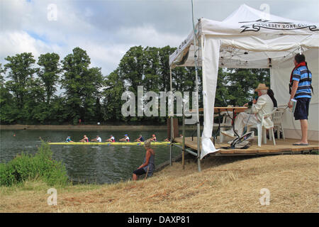 Twickenham Rowing Club men's coxed eight cross the finish line at Molesey Amateur Regatta, 20th July 2013, River Thames, Hurst Park Riverside, East Molesey, near Hampton Court, Surrey, England, Great Britain, United Kingdom, UK, Europe Credit:  Ian Bottle/Alamy Live News Stock Photo