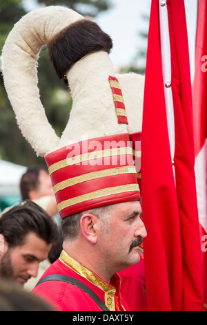 Member of the Turkish military fanfare 'Mehter' wears traditional Janissary costume during the Turkish Festival in Bucharest. Stock Photo