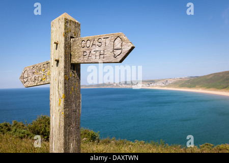 Coastal path with a sign, alongside Woolacombe beach in Devon, England. Stock Photo