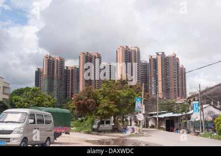 Newly built high-rise apartment buildings can be seen nearing completion in Tanzhou Guangdong, China. Stock Photo
