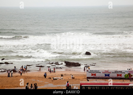 Tourists enjoying on the beach, Visakhapatnam, Andhra Pradesh, India Stock Photo