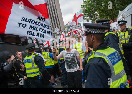 Birmingham, UK. 20th July, 2013. English Defence League supporters were to be escorted by police to Centenary Square in central Birmingham for a planned EDL demonstration, however members of the group soon pushed through containment lines and police quickly lost control. 20/07/2013 Birmingham, United Kingdom. Credit:  Peter Manning/Alamy Live News Stock Photo