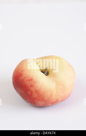 Donut Peaches also known as Saturn peaches Stock Photo