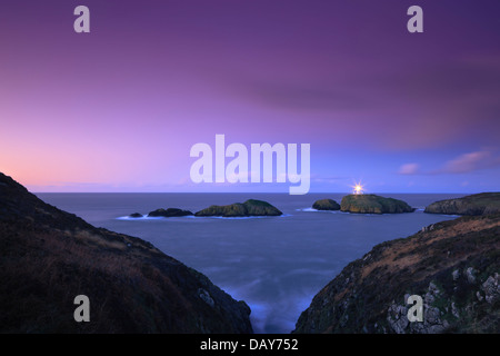 Lighthouse at Strumble Head Fishguard Pembrokeshire Wales at night Stock Photo