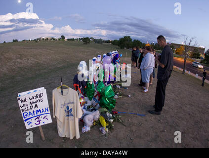 Aurora, Colorado, USA. 20th July, 2013. July 20, 2013 - Aurora, Colorado, U.S - People gather at the site of the Aurora Century 16 Memorial across the street from the theater to honor the victims during the 1 year Anniversary. Credit:  Hector Acevedo/ZUMAPRESS.com/Alamy Live News Stock Photo