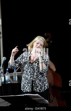 Marlborough, Wiltshire, UK, Saturday, 20th July 2013.  Jazz singer Clare Teal performs with the BBC Radio Leeds Big Band in the Priory Marquee at the Marlborough Jazz Festival in Wiltshire. Stock Photo