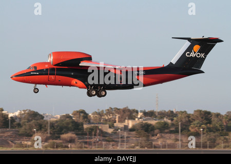 Air freight transport. Cavok Air Antonov An-74 cargo plane landing in Malta Stock Photo