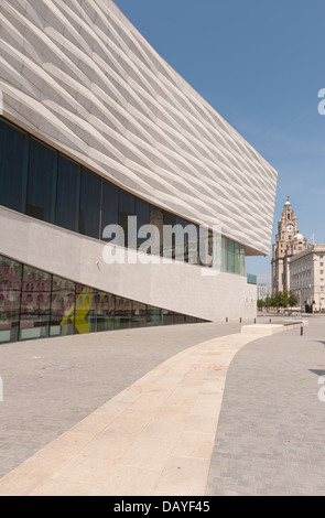 Museum of Liverpool spacious design against blue sunny sky beside Three Graces strong building architectural lines shapes Stock Photo