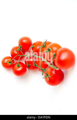 Clusters of ripe cherry tomatoes isolated on white background Stock ...