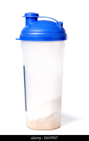 Plastic protein shaker with blue top and whey powder inside Stock Photo
