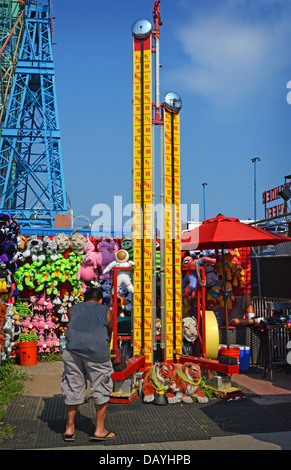 Test of strength at Coney Island in Brooklyn, New York Stock Photo