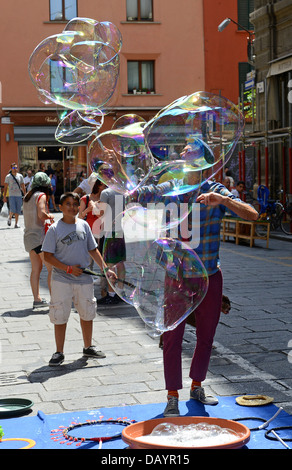 Man making bubbles in Bologna Italy Stock Photo