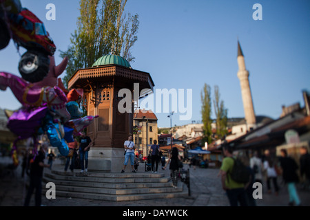 Sebilj (pseudo-Moorish style wooden fountain) the square in Bascarsija the Turkish Quarter in Bosnian capital city of Sarajevo. Stock Photo