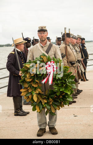 Civil War re-enactors during a ceremony unveiling a memorial honoring the all black 54th Massachusetts Volunteer Infantry on the 150th anniversary of the assault on Battery Wagner July 21, 2013 in Charleston, SC. The battle memorialized in the movie 'Glory' took place in Charleston and was the first major battle of an all black regiment. Stock Photo