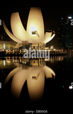 The ArtScience Museum at Marina Bay Sands Singapore at Night Stock Photo