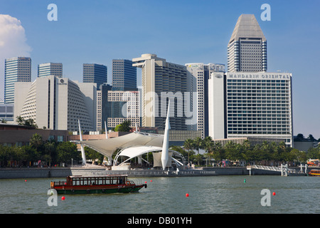 Esplanade Theaters with Suntec City skyscrapers at the background, Singapore. Stock Photo