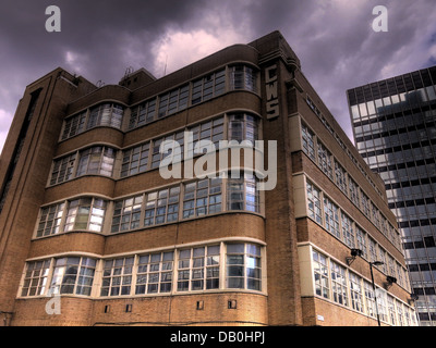 The 1920s style CWS building with stormy sky Stock Photo