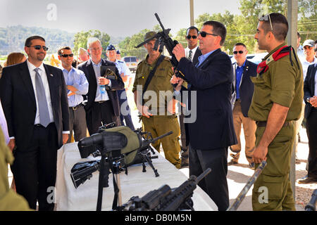 US Deputy Secretary of Defense Ashton Carter inspects weapons of the Israel Defense Force during a visit to Camp Mitkan Adam July 21, 2013 in Modi'in-Maccabim-Re'ut, Israel. Stock Photo