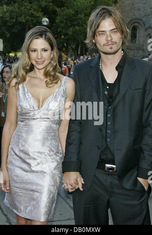 Actress Mira Sorvino and her husband, actor Christopher Backus, arrive for the world premiere of her film 'Reservation Road' at the 32nd annual International Film Festival in Toronto, Canada, 13 September 2007. Photo: Hubert Boesl Stock Photo