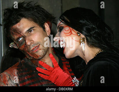 Singer Marc Terenzi (L) and his wife and singer Sarah Connor, both in gory costumes, are pictured at the adventure park 'Europark' in Rust, Germany, 02 October 2007. The horror show 'Terenzi Horror Nights' runs until 04 November 2007 at the park. Photo: Patrick Seeger Stock Photo