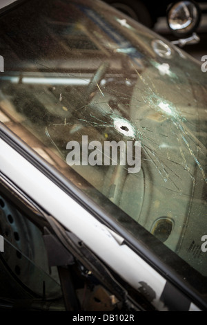 Bullet Riddled Automobile Windshield, NYC, USA Stock Photo