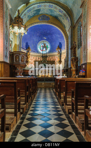 The interior of the incredibly beautiful church of Saint Mary Magdalene in Rennes-le-Château in the South of France. Stock Photo