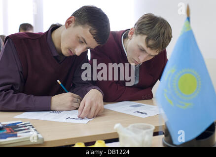 Pupils in their penultimate year are pictured during German class at a German-speaking school in Astana, Kazakhstan, 21 October 2007. The school forms part of an educational facility, in which children are taught in German from an early age up to the school leaving examination. Photo: Peer Grimm Stock Photo