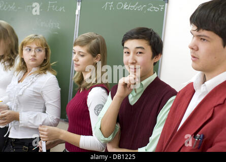 Pupils in their penultimate year are pictured during German class at a German-speaking school in Astana, Kazakhstan, 21 October 2007. The school forms part of an educational facility, in which children are taught in German from an early age up to the school leaving examination. Photo: Peer Grimm Stock Photo