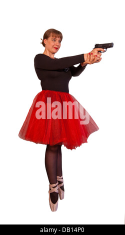 Young attractive woman in black-red ballerina dress holds black gun by two hands on isolated background Stock Photo