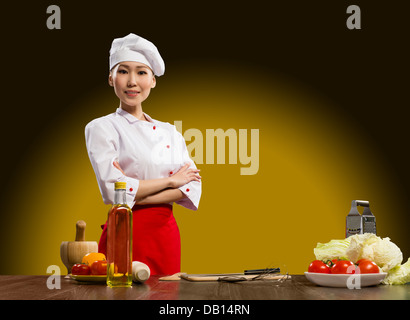 Portrait Asian woman cooks Stock Photo