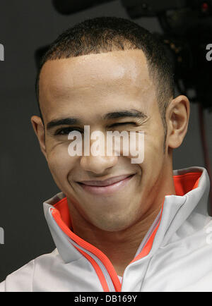 British Formula One pilot and runner-up world champion, Lewis Hamilton of McLaren-Mercedes, is pictured at the Mercedes-Benz motorsports event 'Stars & Cars' in Stuttgart, Germany, 03 November 2007. Hamilton expects Nico Rosberg from Wiesbaden, Adrian Sutil from Graefelfing or Finish Heikki Kovalainen to be his new team colleagues. Hamilton asserted, that he knew all three of them  Stock Photo