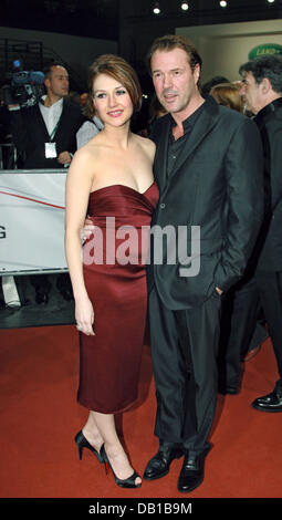 Actor couple Sebastian Koch and Carice van Houten pose on the red carpet as they arrive at the 20th European Film Awards ceremony in Berlin, Germany, 01 December 2007. The European Film Awards are presented by the European Film Academy in Berlin and another European city in an annual alternation. Photo: Jens Kalaene Stock Photo