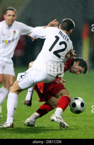 Gonzalo Castro (back) of Bayer 04 Leverkusen vies for the ball with Jan Rezek (front) of AC Sparta Praha during the group E UEFA Cup match at BayArena in Leverkusen, Germany, 06 December 2007. Leverkusen defeated Sparta 1-0. Photo: Franz-Peter Tschauner