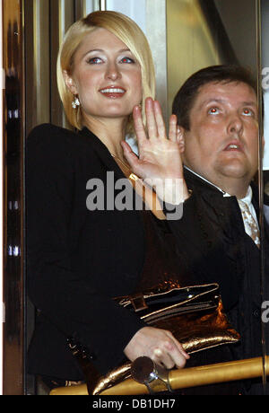 Hotel heiress Paris Hilton arrives at an autograph session in Berlin, 12 December 2007. Hilton pays the German capital a five-day visit. Photo: Wolfgang Kumm Stock Photo