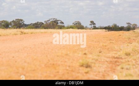 Dry, barren ground in drought conditions in outback Queensland, Australia Stock Photo