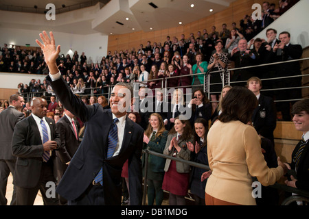 US President Barack Obama and First Lady Michelle Obama greet audience members following the President's remarks at the Belfast Waterfront Convention Center June 17, 2013 in Belfast, Northern Ireland. Stock Photo