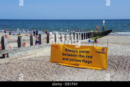 Littlehampton UK 18 July 2013 - RNLI Lifeguards swimming warning notice sign at Littlehampton beach and seafront Stock Photo