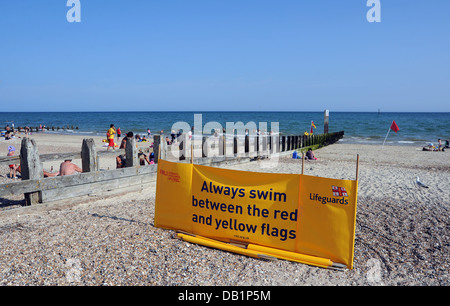 Littlehampton UK 18 July 2013 - RNLI Lifeguards swimming warning notice sign at Littlehampton beach and seafront Stock Photo