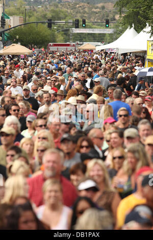 Prescott, AZ, USA. 21st July, 2013. Thousands of people pack the streets during 'Prescott Strong' in Prescott, Arizona. The 8 hour concert benefit honored the 19 Granite Mountain Hotshots killed in the Yarnell fire. Credit:  Krista Kennell/ZUMAPRESS.com/Alamy Live News Stock Photo