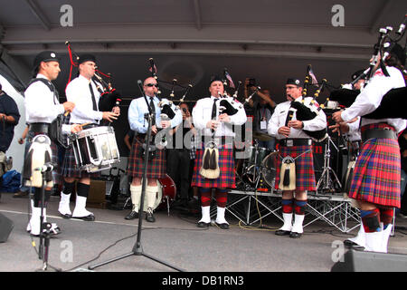 Prescott, AZ, USA. 21st July, 2013. Bagpipers play onstage during 'Prescott Strong' in Prescott, Arizona. The bagpipers honored 19 Granite Mountain Hotshots killed in the Yarnell fire during an 8 hour benefit concert. Credit:  Krista Kennell/ZUMAPRESS.com/Alamy Live News Stock Photo