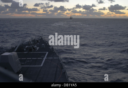 Arleigh Burke-class destroyer USS Momsen (DDG 92) (left) and Royal Australian Navy guided-missile frigate HMAS Sydney (FFG 03) Stock Photo