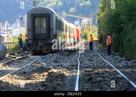 The damage to the tracks is clearly visible after the derailed train cars have been removed from the accident site on the West Rhine Railway in St. Goar, Germany, 12 September 2011. A passenger train derailed due to a landslide after heavy rain. 15 of the 800 passengers as well as the train driver were injured. The West Rhine Railway is expected to be closed between Boppard and Obe Stock Photo