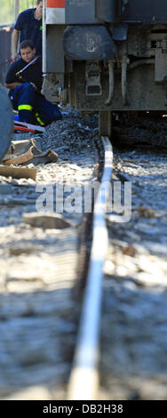 The damage to the tracks is clearly visible after the derailed train cars have been removed from the accident site on the West Rhine Railway in St. Goar, Germany, 12 September 2011. A passenger train derailed due to a landslide after heavy rain. 15 of the 800 passengers as well as the train driver were injured. The West Rhine Railway is expected to be closed between Boppard and Obe Stock Photo