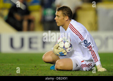 Munich's goalkeeper Manuel Neuer saves the abll during the Champions League group A soccer match between Villarreal CF and FC Bayern Munich at El Madrigal stadium in Villarreal, Spain, 14 September 2011. Bayern won 0-2. Photo: Andreas Gebert Stock Photo