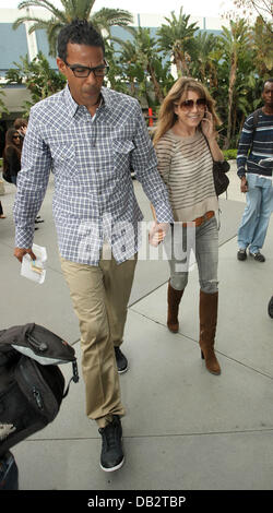 Ellen Pompeo and Chris Ivery,  arriving at the Staples Center for the Los Angeles Lakers against Denver Nuggets  NBA basketball game. Los Angeles, California - 03.04.11 Stock Photo